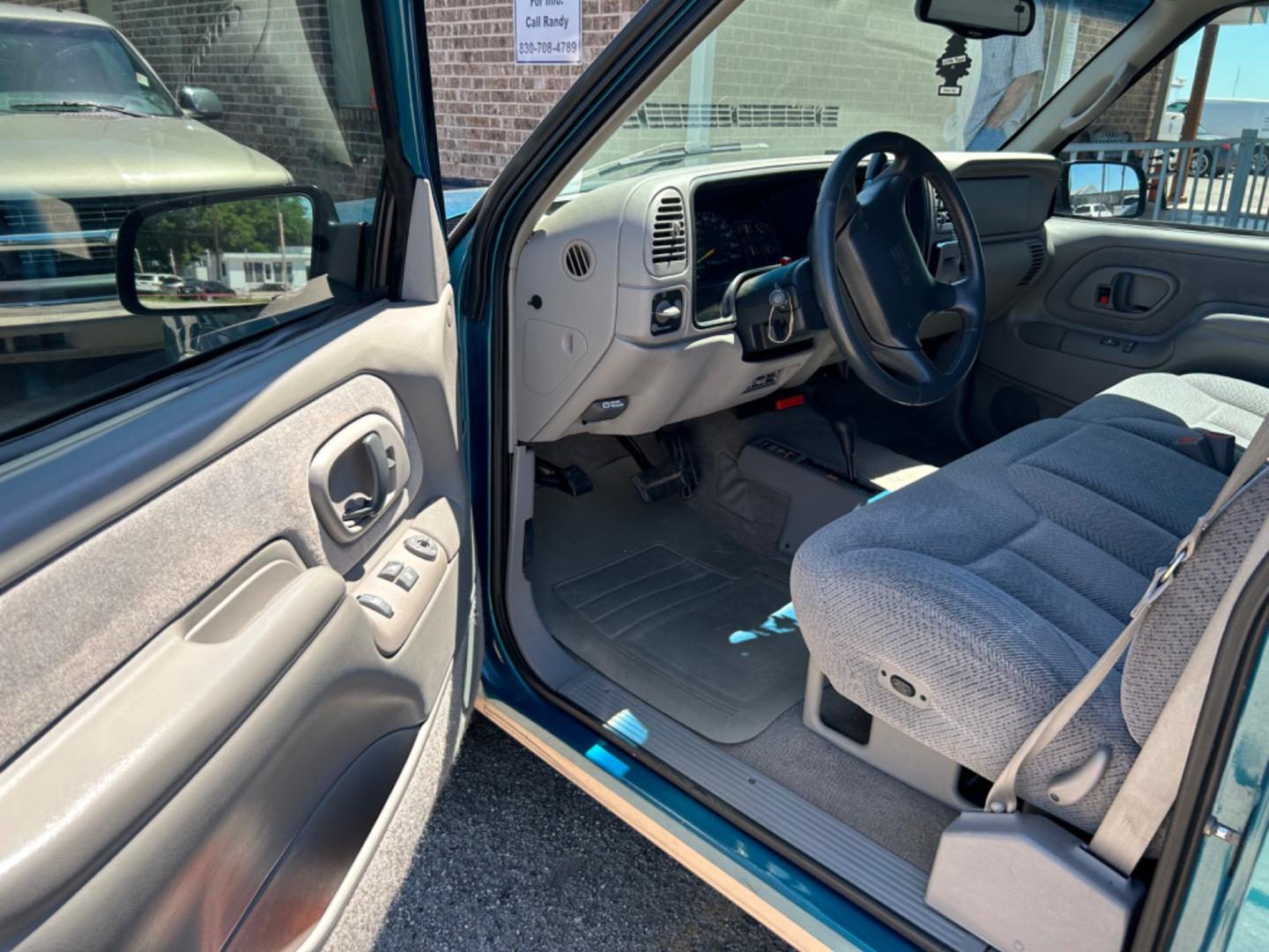 1997 Blue GMC Sierra C/K 1500 Sierra (1GTEK14R3VZ) with an 5.7L V8 F engine, Automatic transmission, located at 1687 Business 35 S, New Braunfels, TX, 78130, (830) 625-7159, 29.655487, -98.051491 - Photo#4